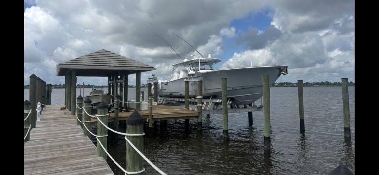 Boat lift at a waterfront dock in Port St. Lucie